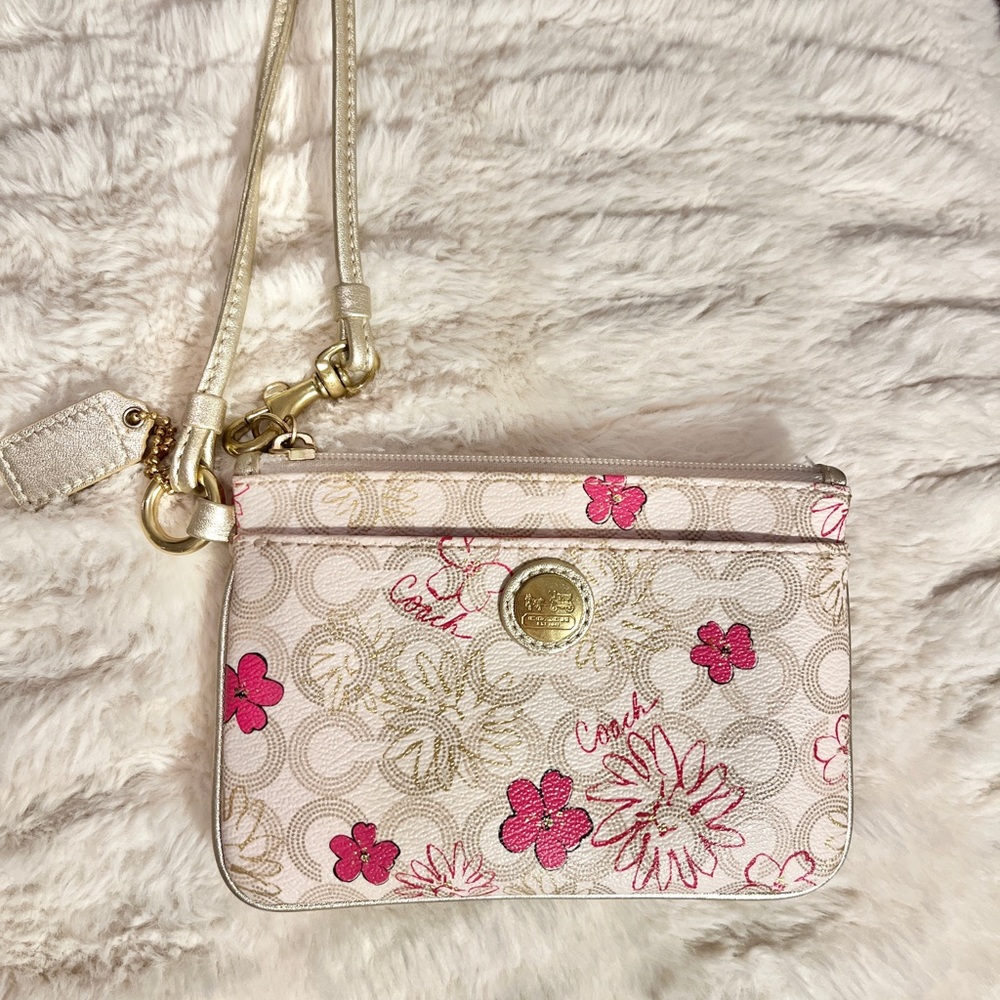 Coach pink and white leather wristlet
